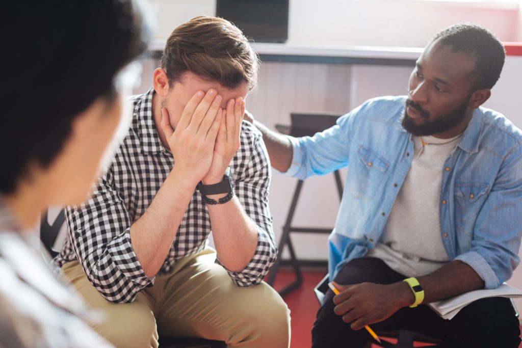 11 Tips To Help An Alcoholic Family Member Or Friend 2 men in a 12-Step recovery group