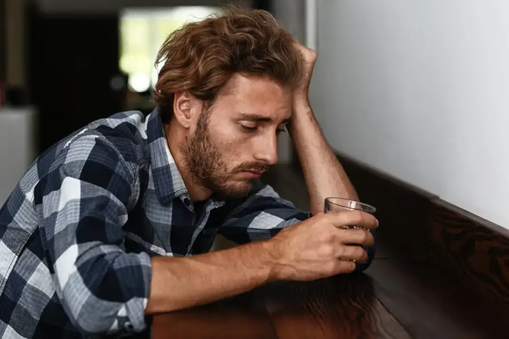 11 Tips To Help An Alcoholic Family Member Or Friend 1 man with alcohol addiction